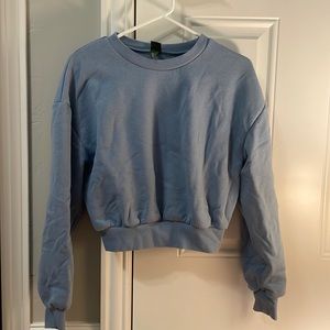 blue sweater (cropped) the material is cotton